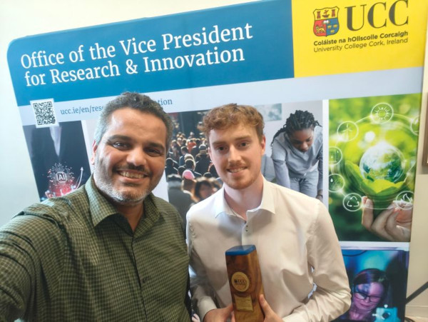 Zahran and Charles in the award ceremony